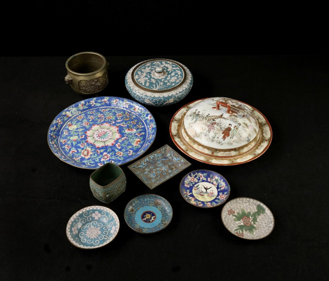 10 Asian Decorative Objects: Comprises cloisonne and enamel articles, bronze bowl, Japanese porcelain covered dish. 10 items. [Largest: 9 1/2" Dia]. Oxidation to some pieces, a few chips to enamel.