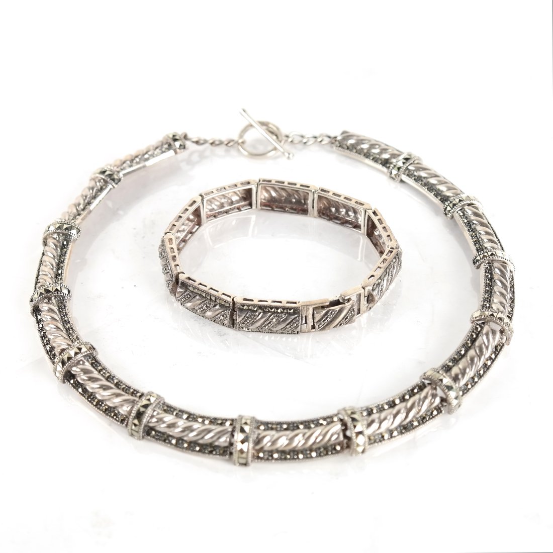 Sterling "Jewel" Choker, Bracelet: Sterling silver and faceted "jewel" choker with matching bracelet comprising hinged links. Each makred "925", and "FAB (?)". [Choker: 14"; Bracelet: 7"].