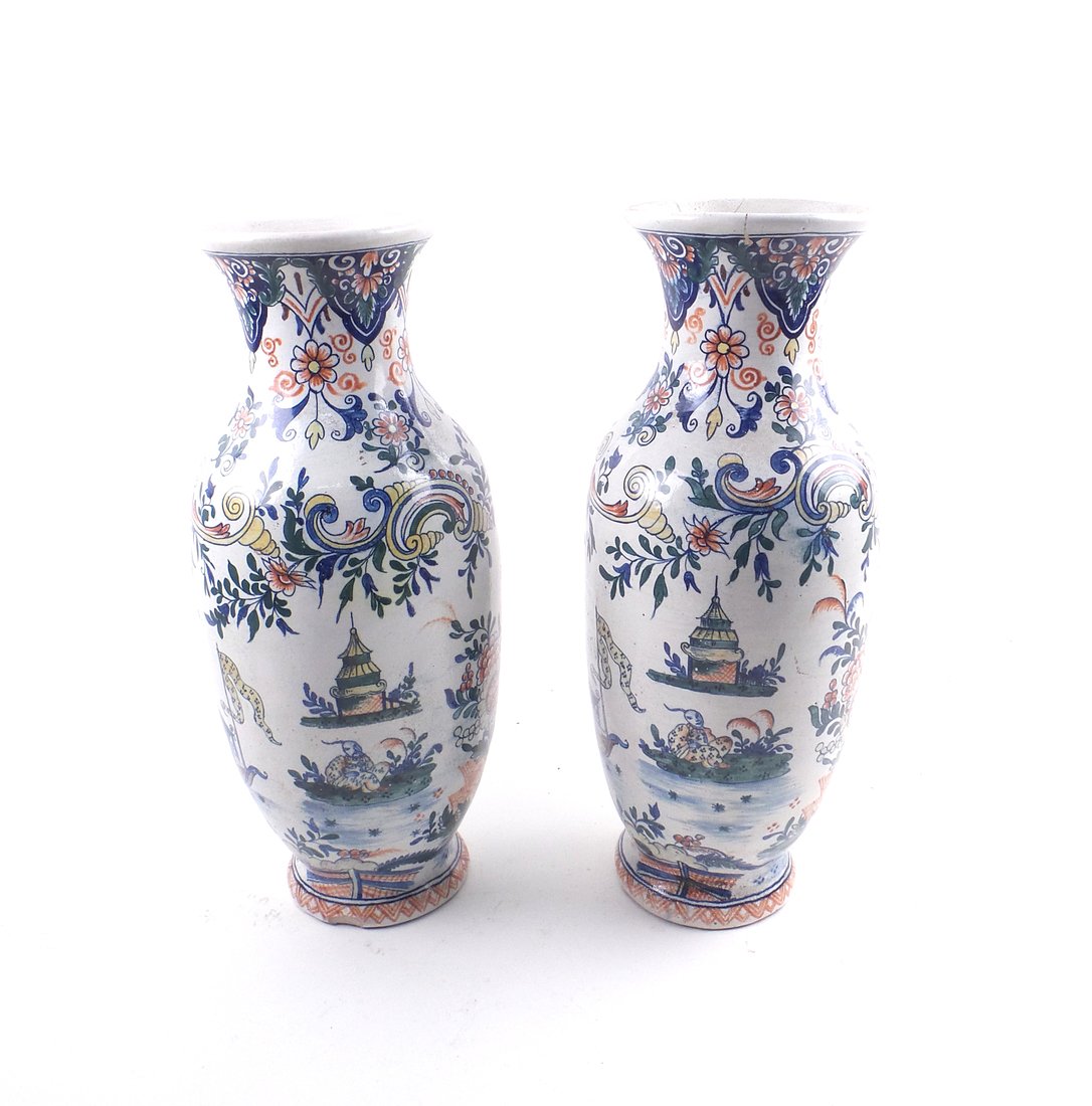 Pair of French Faience Ovoid Vases: Circa 1900, polychrome glazed with chinoiserie figures and foliage. [12" H x 5 1/4" Dia]. Repairs, chips, sold "as is".