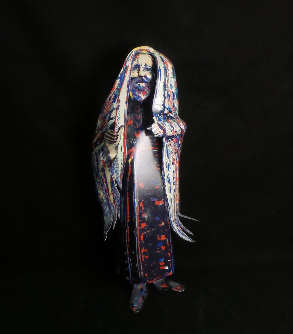 Tole Peinte Figure of a Rabbi: Tole peinte figure of a Rabbi by Mimi Gross, 1983. #28/135. Cut and realistically painted, with easel support. [24" x 11" x W x 9" D].