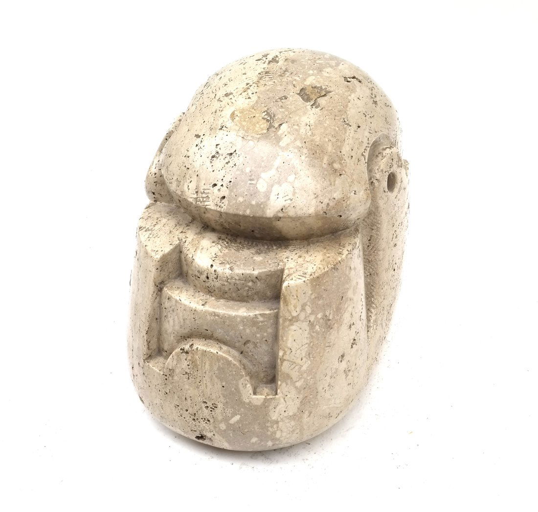 Carved Travertine Stone Sculptural Head: Carved travertine stone sculptural head. En suite with the preceding lot. [12" H x 10 1/2" W x 13 3/4" D].