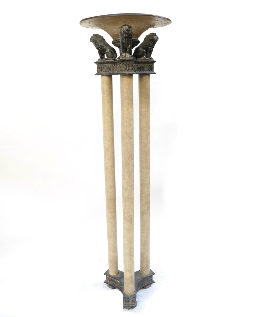Neoclassical Style Electrified Torchiere: Late 20th century neoclassical style patinated and painted metal electrified torchiere, modeled as three columns with seated lion surmounts and fitted with a molded plastic lampshade. [75" H x 22" Dia