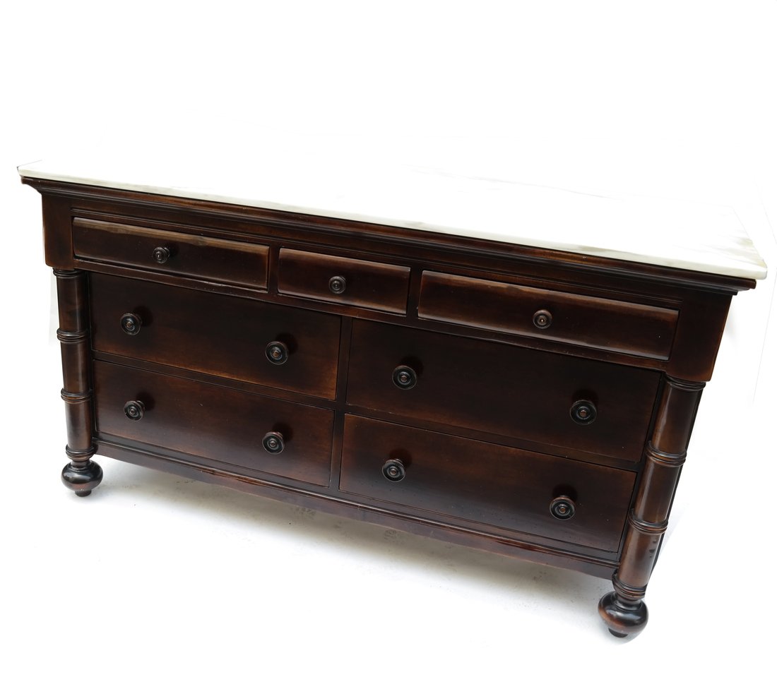 Antique Style 7 Drawer Chest: Antique style 7 drawer chest with a marble top. Fitted with 3 drawers over 4 smaller drawers, with Abc carpet makers mark on the back. [39 1/2" H x 69 1/2" W x 25" D]. In good condition.