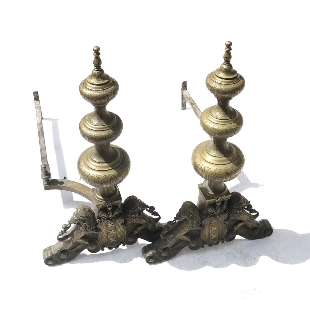 Pair of Brass Andirons: Pair of brass andirons. [31 1/2" H x 18 3/4" W x 34" D]. Rust, scratches and scuffs.