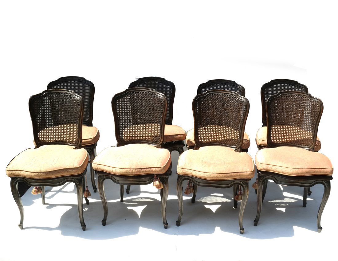 Set of Eight Louis XVI Side Chairs: Set of eight Louis XVI Side Chairs with cane backs and seat. [38" H x 20" W x 19" D; 18" H to seat]. Nicks and scratches to carved wood. Some of the seat should be replaced.