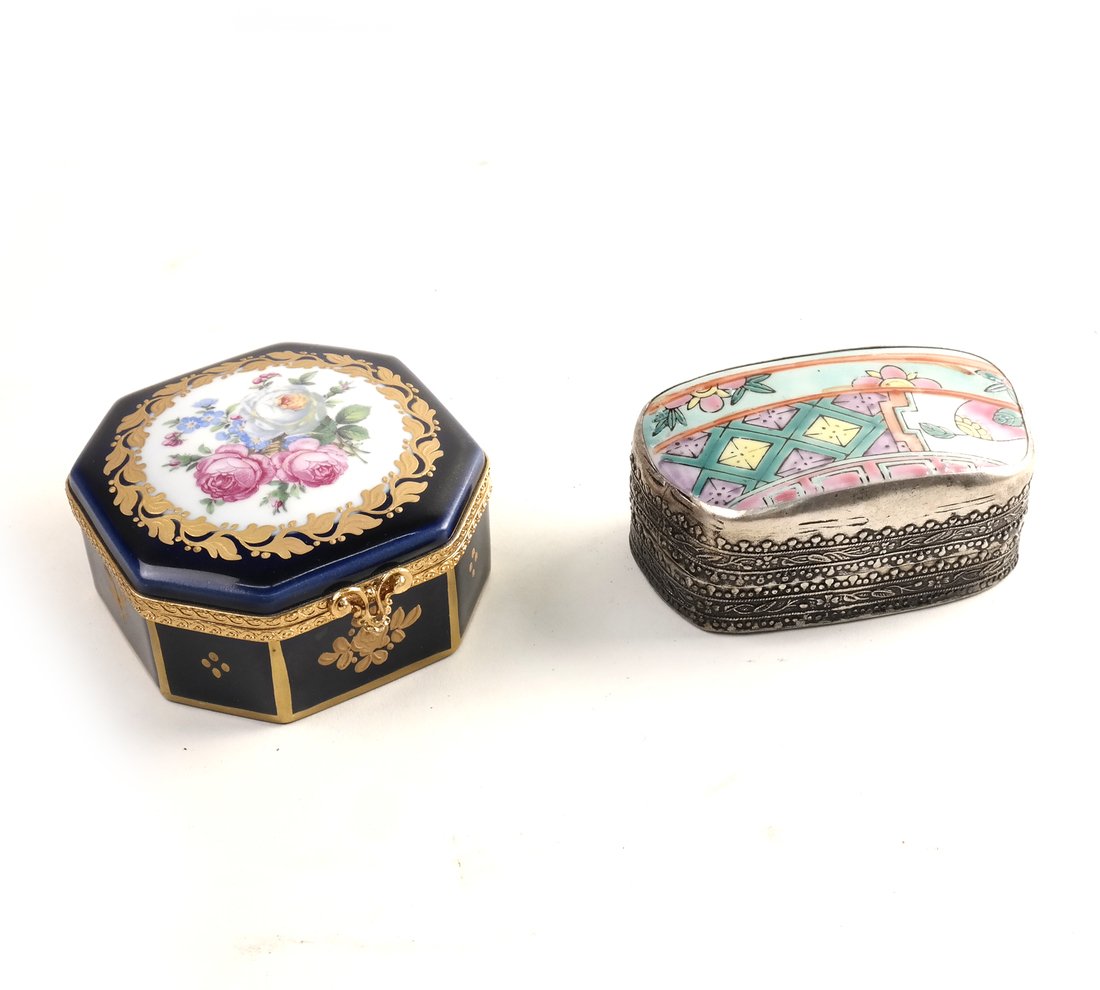 Two Various Trinket Boxes: Two various trinket boxes. 1.) Limoges painted trinket box. [1 1/4" H x 3 1/4" W]. Good condition. 2.) Silver colored metal box with painted porcelain. [1 1/4" H x 3 1/2" W]. Good condition.