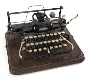 Blickensderfer Typewriter No. 7: Blickensderfer compact typewriter. With box of accessories and extra typing element. Wood base in good condition, case top not pictured. Patents '82-'91. Manufactured in Stamford Connecticut. S/N