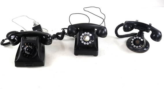 Three Early Telephones: Northern Electric, General Electric and Bell rotary bakelite and metal telephones.