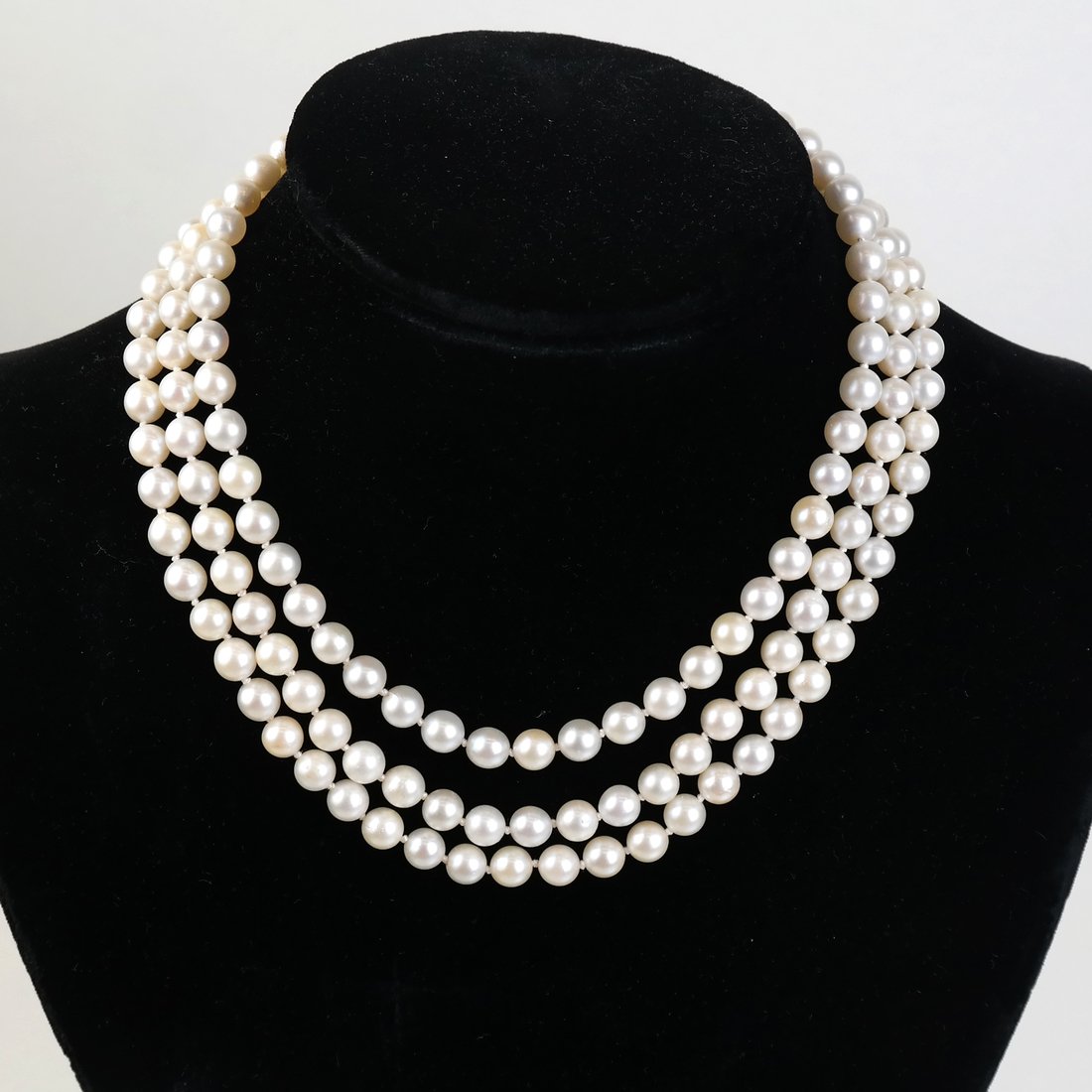 Triple Strand Pearl Choker: Triple strand pearl choker with ruby and 14K YG clasp; 14".