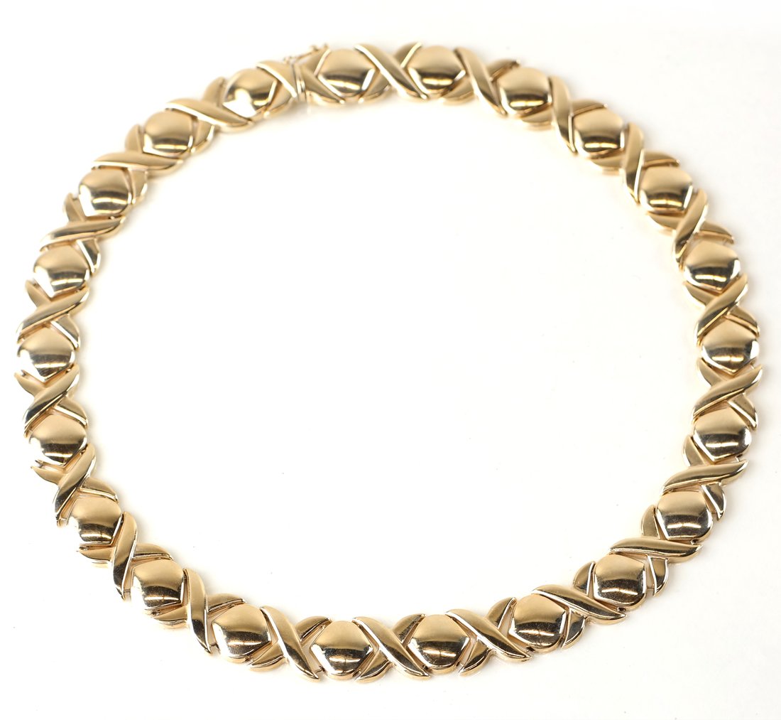 14k Yellow Gold Modern Choker: Necklace having X and O design; 32". 26 DWT.