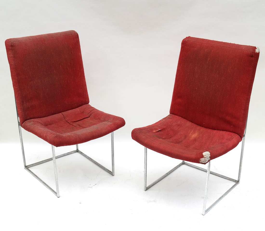 Pair of Chrome and Upholstered Chairs: A pair of chrome and upholstered chairs [36" H x 20 1/2" W x 21 1/2" D]. Surface grime, upholstery is ripped, sold as is.