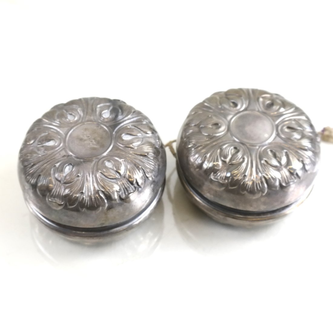 Pair of Silver Yo-Yo's (1 of 5)