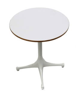 George Nelson for Herman Miller Table: White circular low table designed by George Nelson for Herman Miller. [22 1/2" H x 17" Dia]. Wear, otherwise in overall good condition.