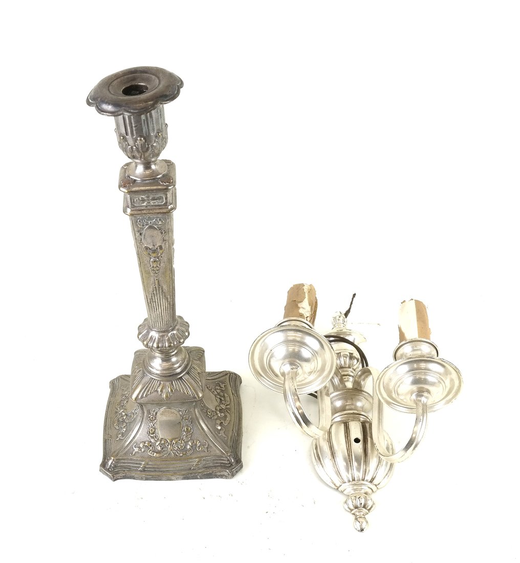 Two Silvered Metal Decorative Objects: Comprises: 1.) Two-arm neoclassical-style wall sconce. [12" H x 8 1/2" W]. Arms are bent. Used condition. 2.) Silvered metal candlestick with a square base and classical design elements featuring bows