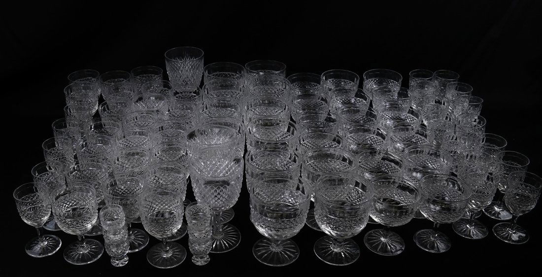 56 Assorted Cut Glass Stemware: All with diamond cut pattern. Includes white wine ,red wine, water glasses and more. [Largest: 6" H x 4" Dia] Some with chips.