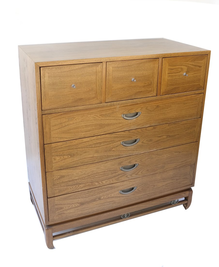 Modern Chest: 20th century, American of Martinsville manufacturer. Having three short central drawers over four long drawers. [ 41 3/4" H x 38" W x 19"D]. Scratches and scuffs.