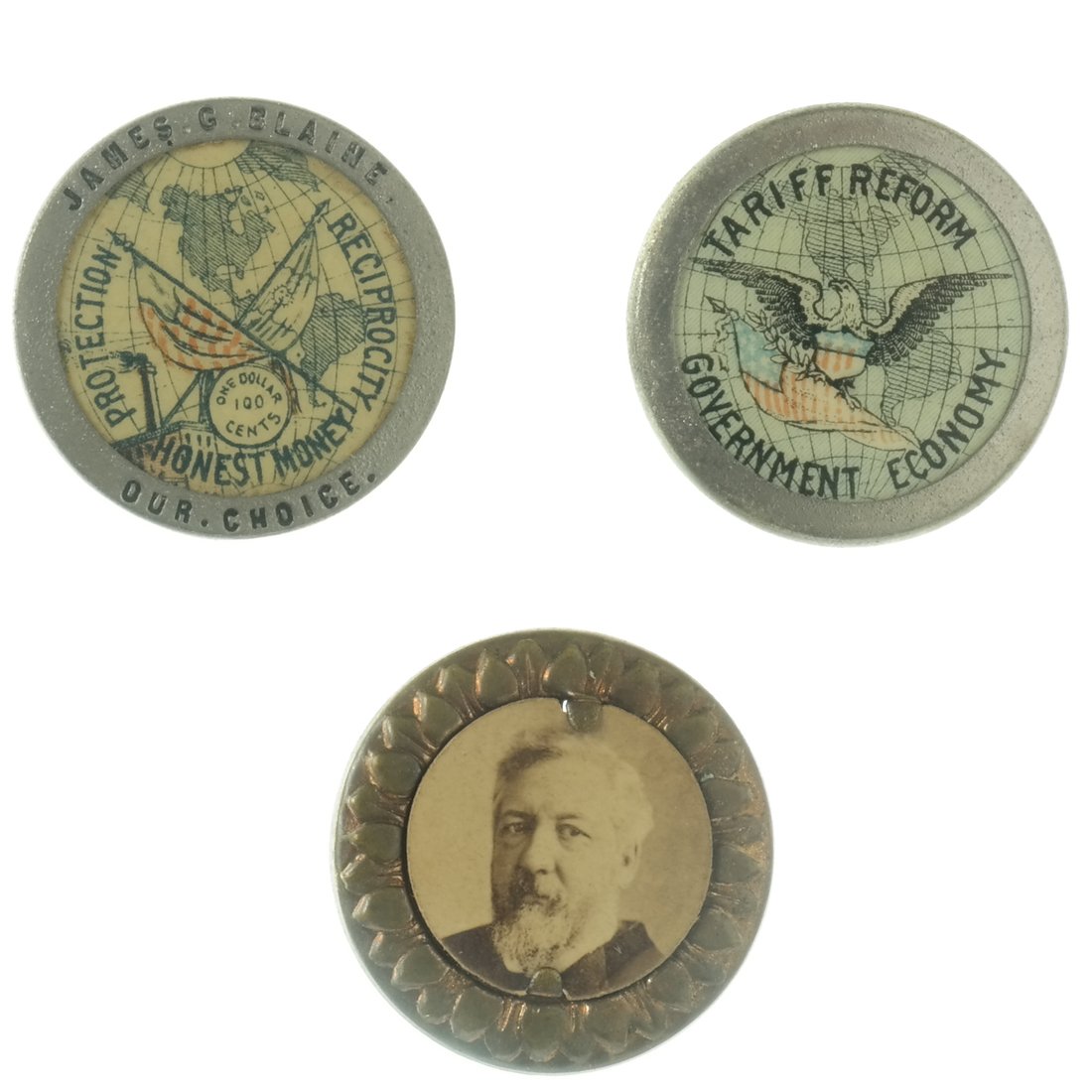 James G. Blaine Three Studs: Three 1884/1888 James Blaine Studs. Comprises: 1.) Pair (possibly matched) of 7/8" early 1888 (pre-convention) white metal studs bearing celluloid inset maps outlining platform of tariff reform and pr