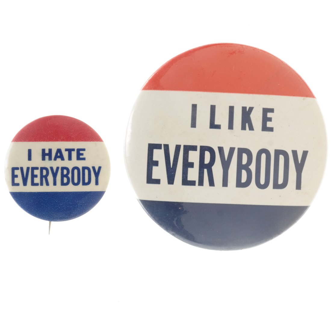 Two Satirical 1956 Pinbacks: Two celluloid pinbacks satirizing popular 'I Like Ike Slogan'. Comprises: 1.) 3-1/2" button reading, "I Like Everybody". 2.) 2" button reading, "I Hate Everybody".