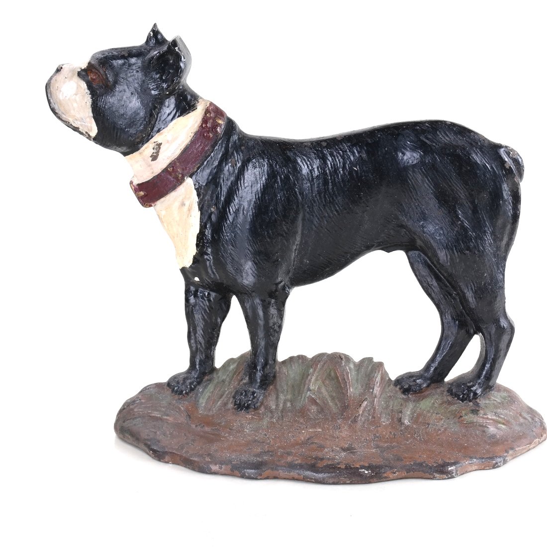 Painted Cast Iron Boston Terrier Doorstop: Modeled as standing on grass.[9 5/8" H x 11 3/4" W].
