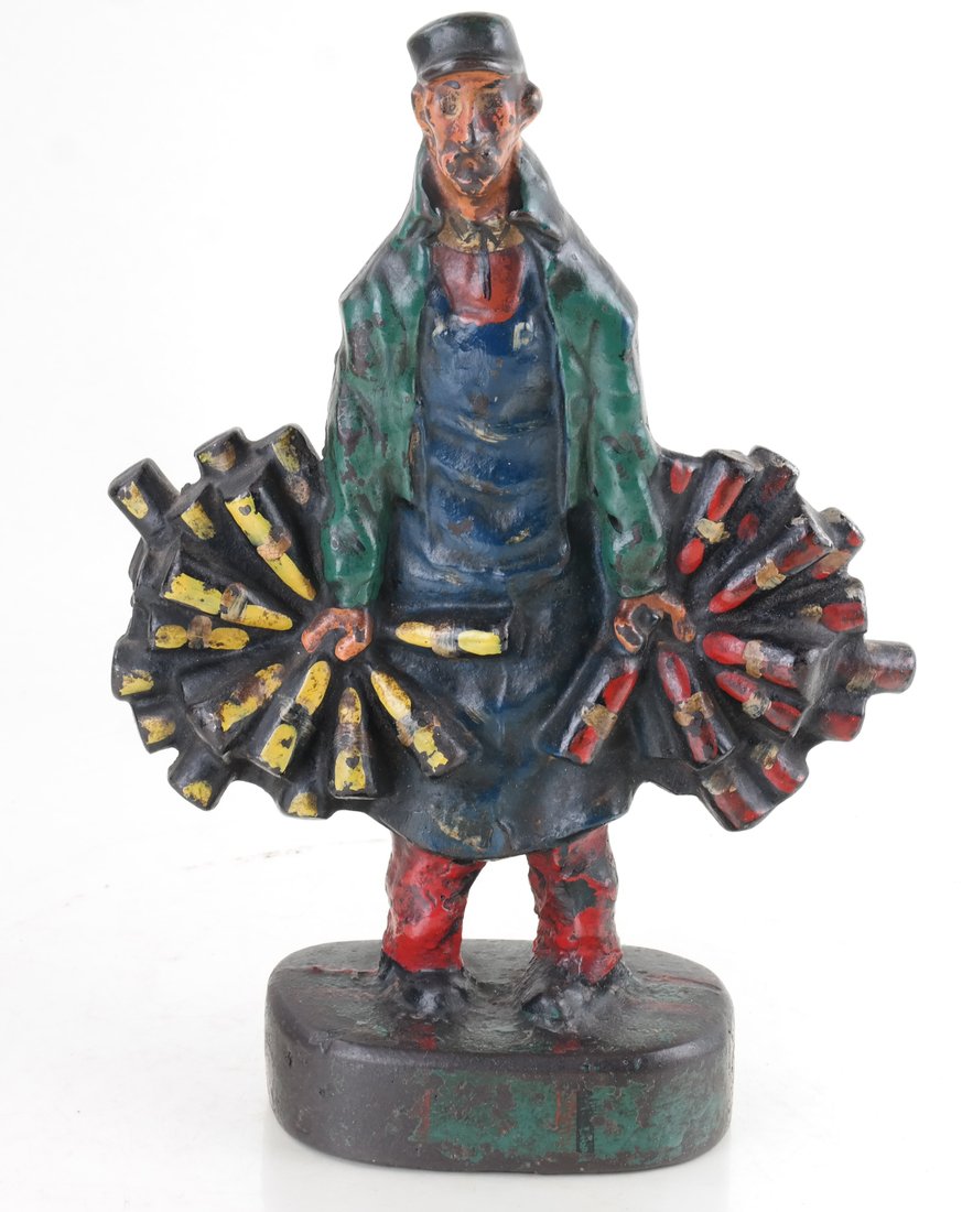 Painted Cast Iron Wine Man Doorstop: Molded as a full-bodied figure, with white wine bottles in his right hand, and red wine bottles in his left hand. {9 1/2" H x 7" W].