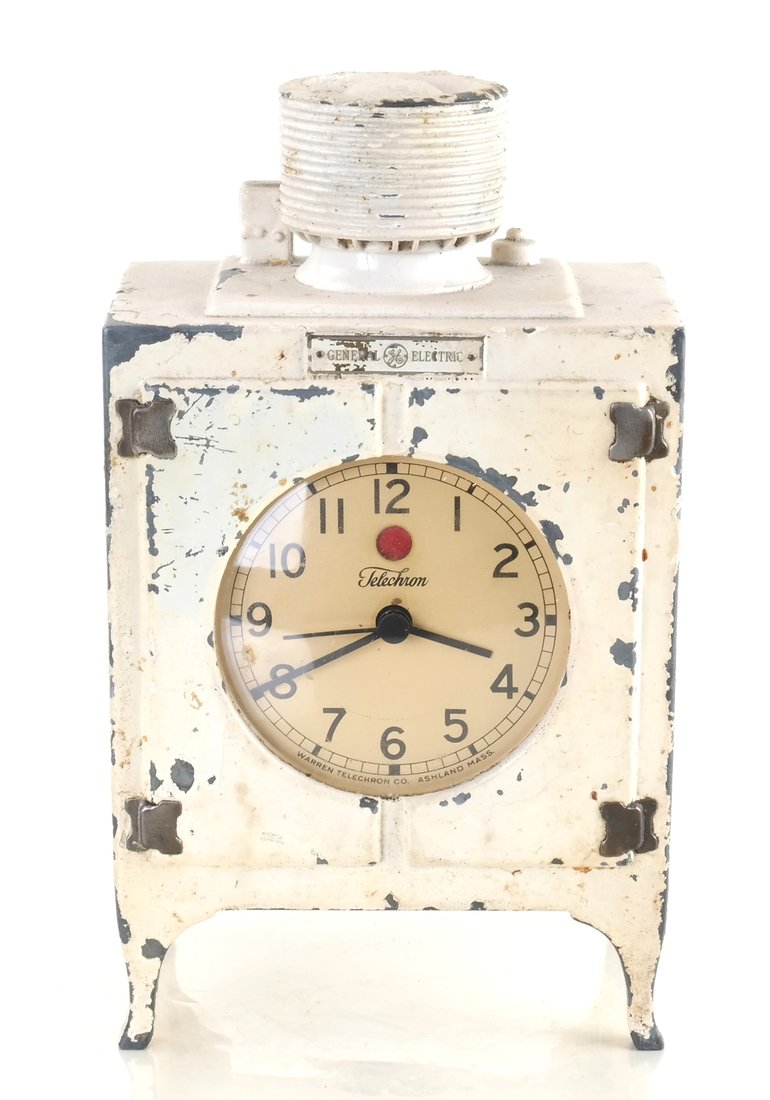 Painted Metal Icebox-form Clock: White painted General Electric Icebox clock by Warren Telechron Co., Ashland, MA, circa 1929 [9" H x 5" W].
