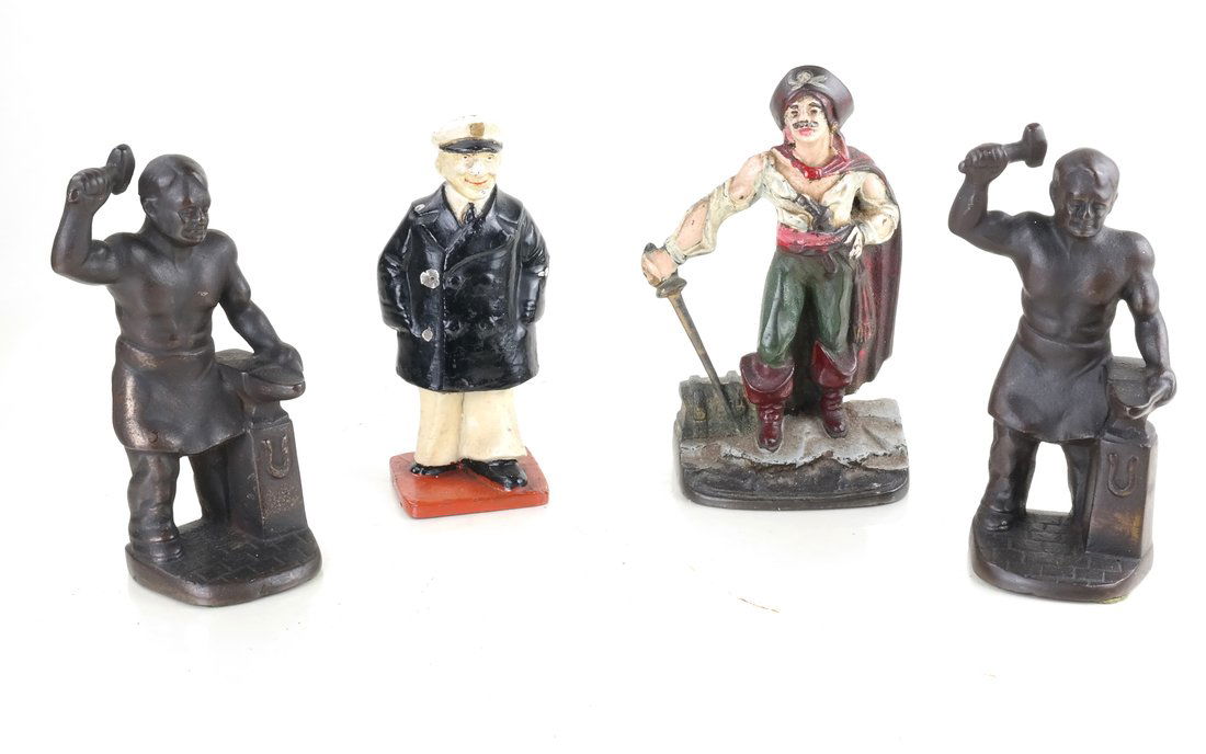 Four Cast Iron Figural Bookends (1 of 9)