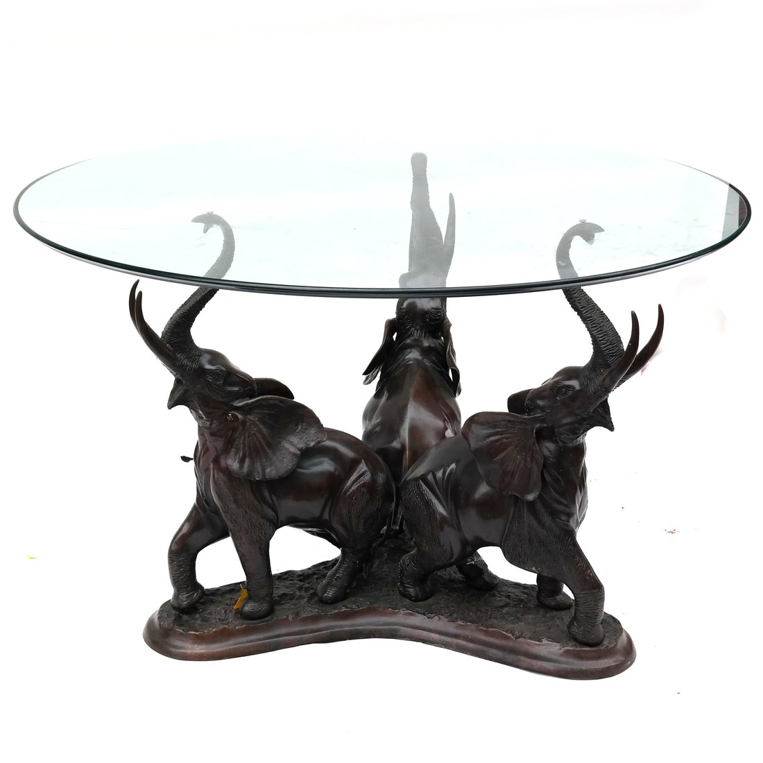 Circular Elephant Form Glass Top Table: Circular elephant form glass top table. [29 1/2" H x 48" Dia.]