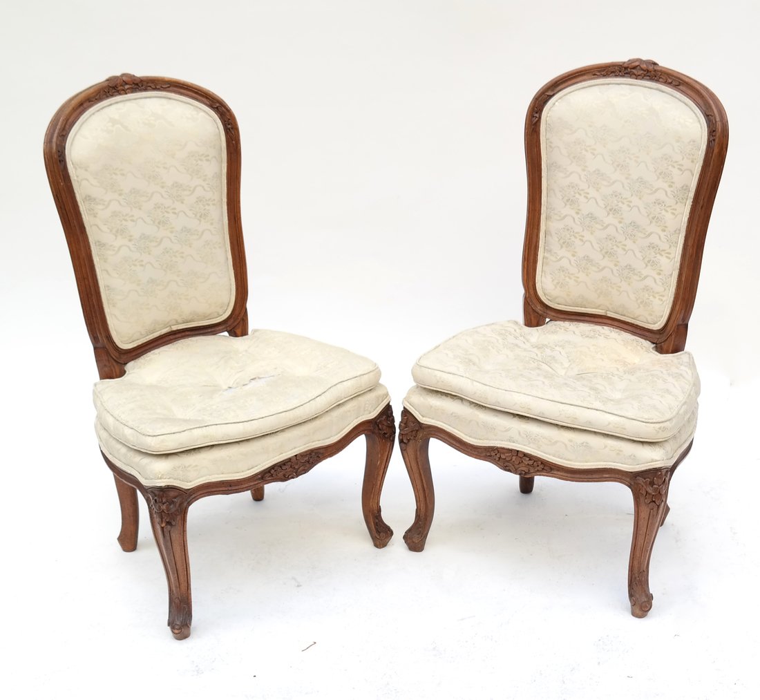 Pair of Loui XV-Style Slipper Chairs: Pair of antique Louis XV-style walnut slipper side chairs. [34" H x 19" W x 15" D; 15" to seat]. Upholstery is worn.