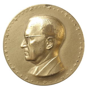 Harry S Truman Inaugural Medal, 1949.: Bronze, 51mm. By Carl Paul Jennewein. HST 1949-3. Obv Bust l. in business suit. Rev Standing Liberty with laurel branch, silhouettes of citizens in 1940’s dress. Tan-gold U.S. Mint patina shows