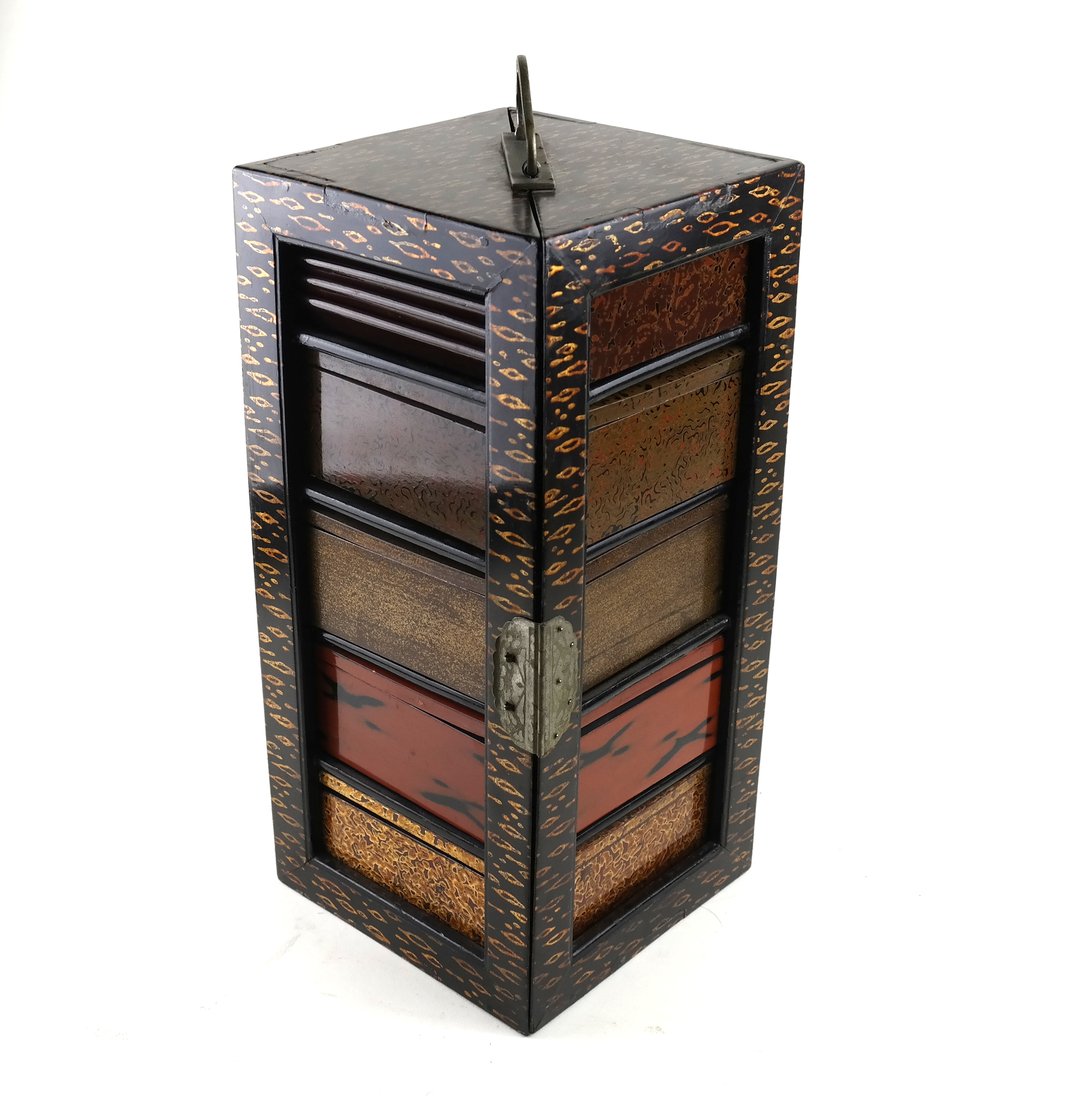Japanese Picnic Box: Japanese Picnic box. Contains five boxes and five plates. [13 1/2" H x 6 1/2" W x 6 1/2" D].