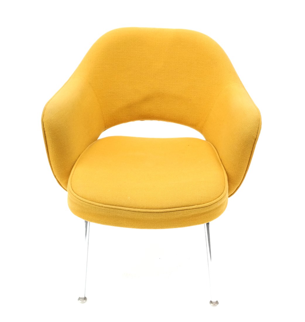 Eero Saarinen Yellow Chair: Chrome and yellow upholstered chair for Knoll. [25" x 24" x 30" H (backs); 17 1/2" H (to seat)].