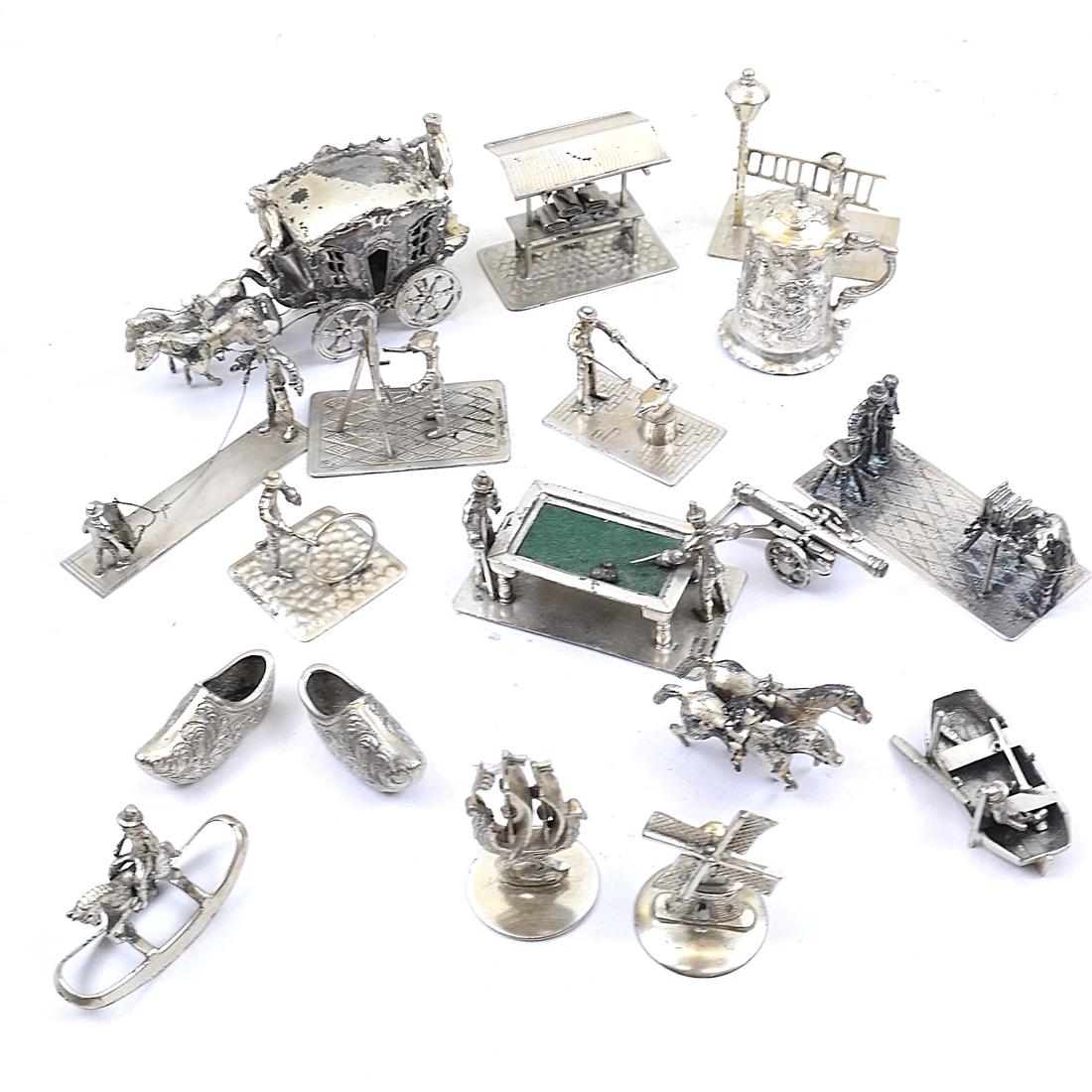 Sterling & Silver-Plate Miniatures: Includes: a horse and carriage, a man in a boat, a cannon, a windmill, a man with a ladder, a boy with a kite, photographers and more.