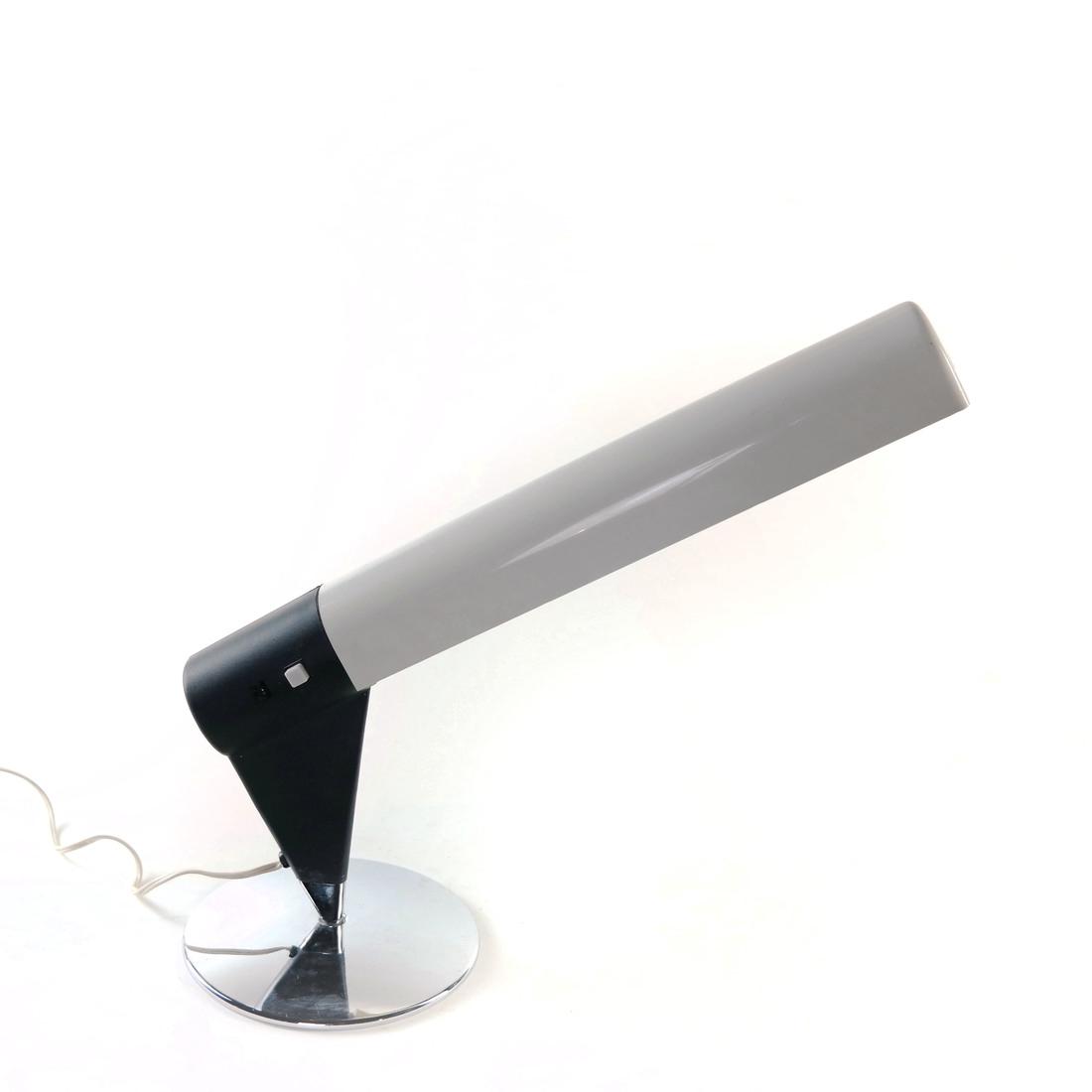 Panasonic Florescent Desk Lamp, FS-4911E: Angled desk lamp fitted with florescent bulb. Japan 1973 Dimensions: Base - 8.50 " L ; Head - 19.50 " L ; 