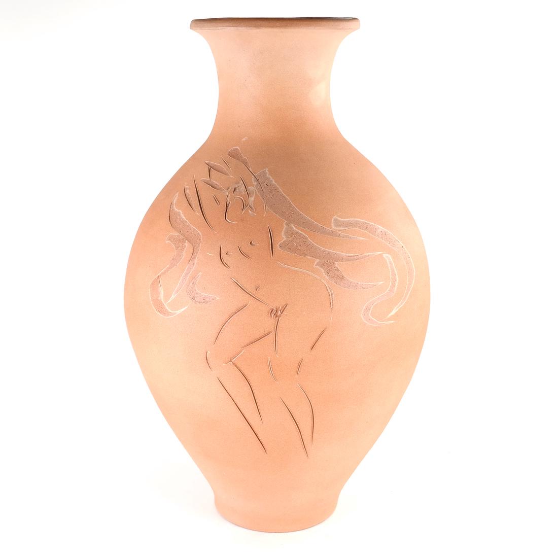 Reuben Nakian, Terracotta Vase: Reuben Nakian (American, 1897-1986). Terracotta vase with incised decoration of a nude female. Inscribed signature on body of vase. Numbered on base along with various inventory stickers from Phillips