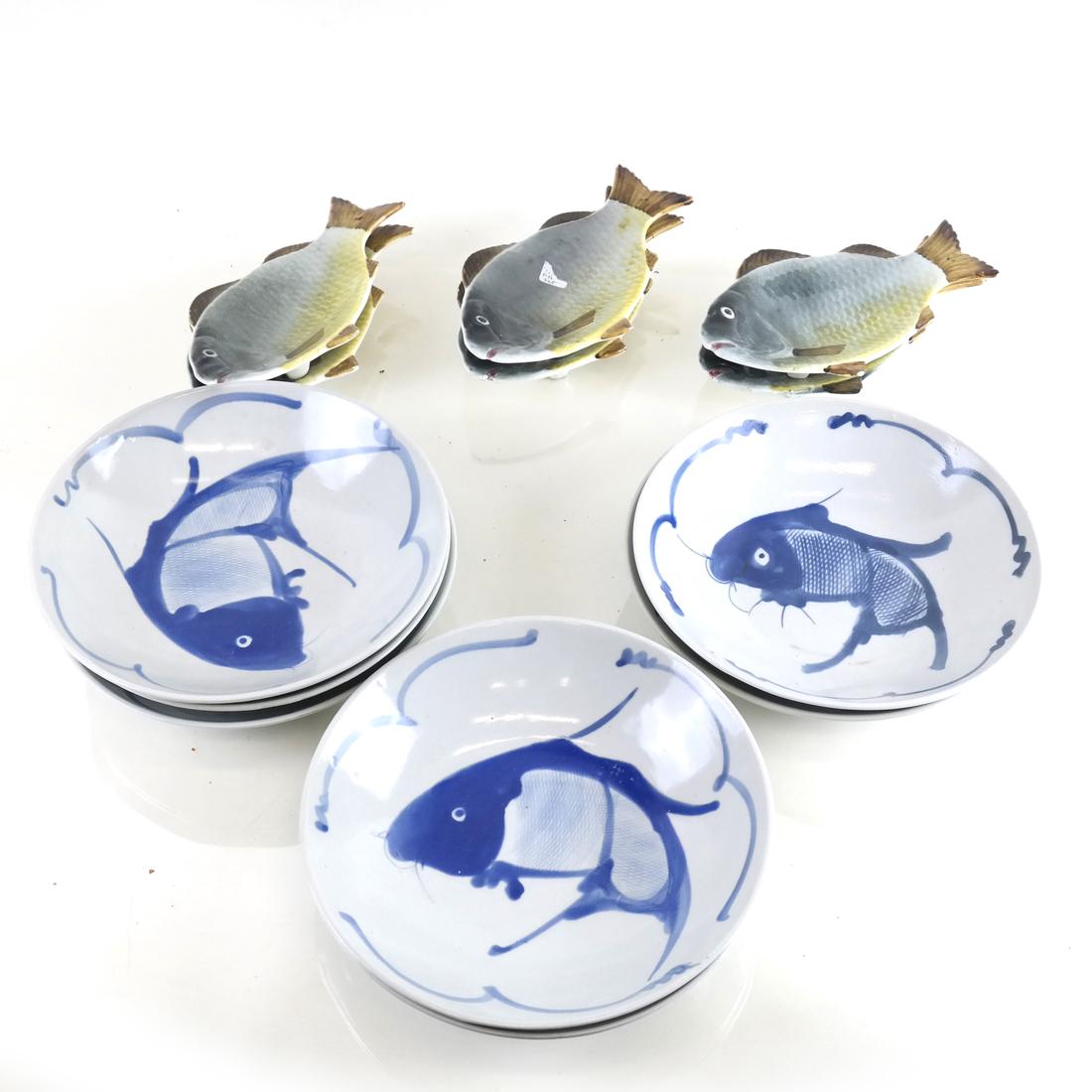13 Fish Decorated Bowls: Includes six fish bowls marked "Good Friend, Spain" and seven blue and white fish bowls. [8" - 9" Dia]. Minor losses.