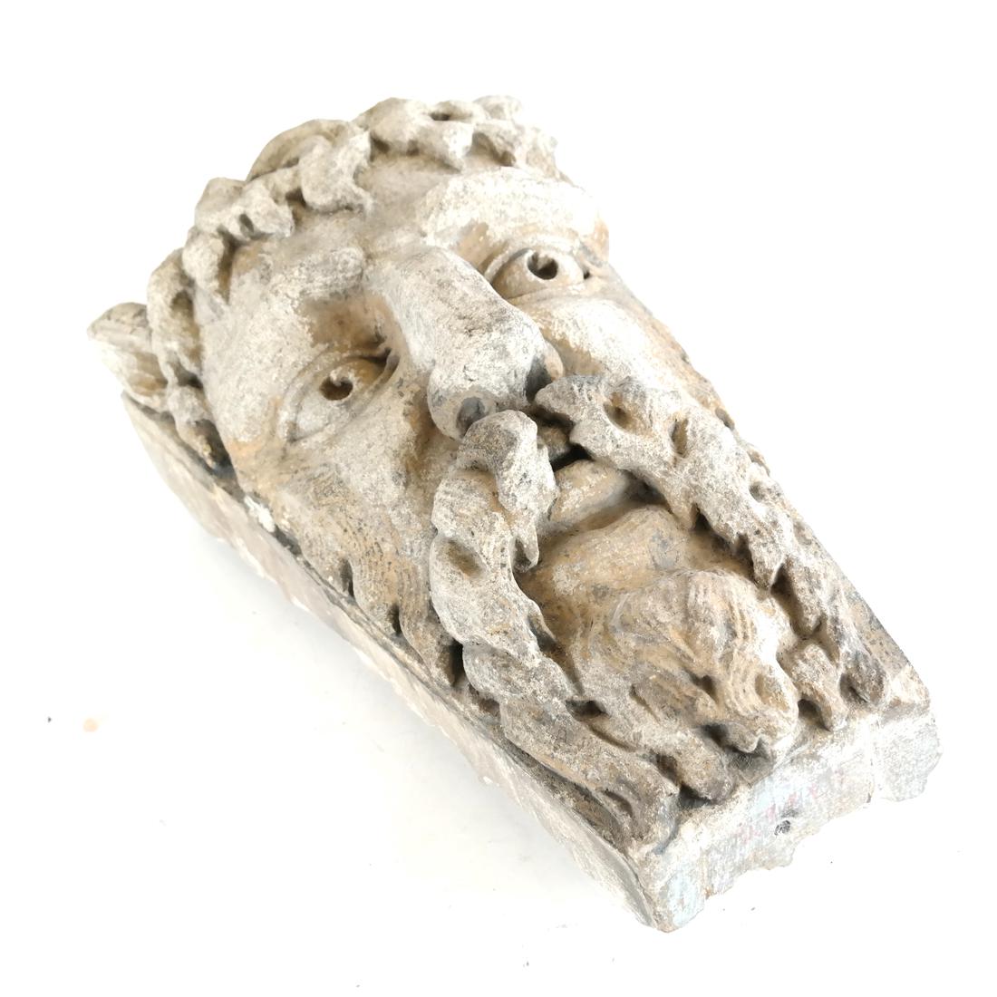 Stone Keystone, Bearded Man: Stone keystone in the form of a bearded man. [17" H x 7" D]. Missing pieces.
