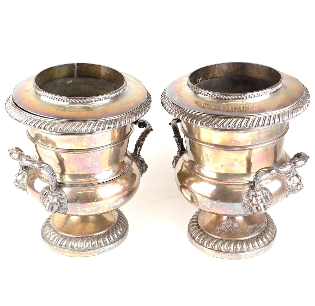 Pair of Sheffield Plate Wine Coolers: Pair of Sheffield plate campana form wine coolers, having lion and scroll handles, gadroon border, unmarked. With liners and collars. [11 1/4" H]. Dents.