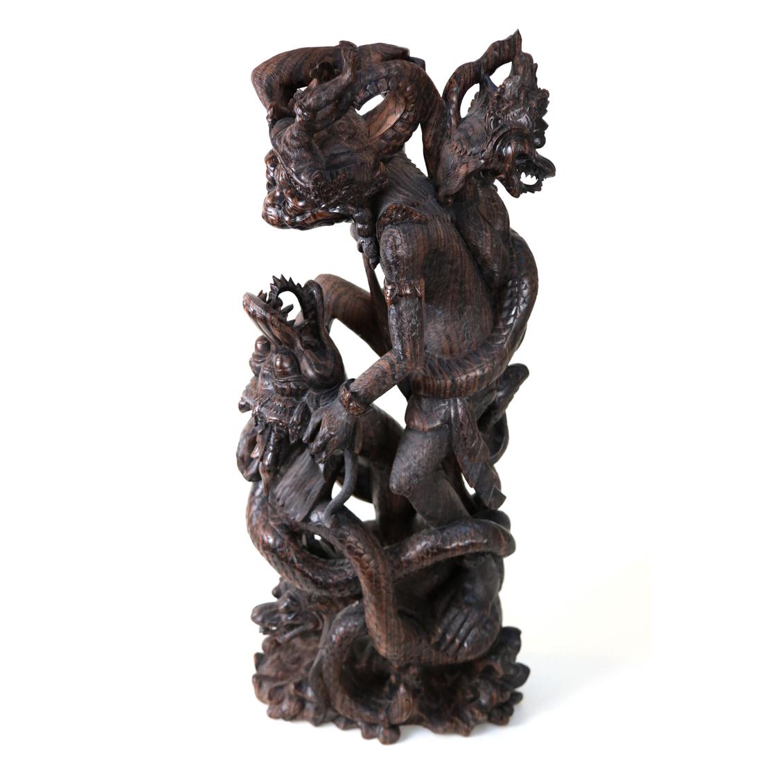 Thai Cambodian Exotic Carved Wood Battle Figures: Exotic wood carved battle, monkey and dragon. [30" H].