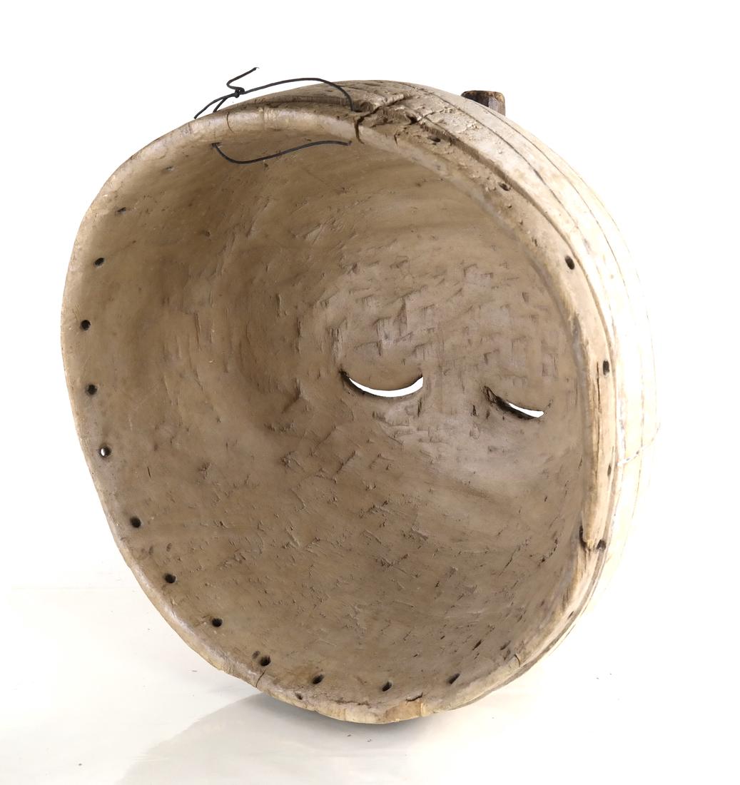 African Tribal Wood Mask: Tribal wood mask. [19" Dia. x 19"].