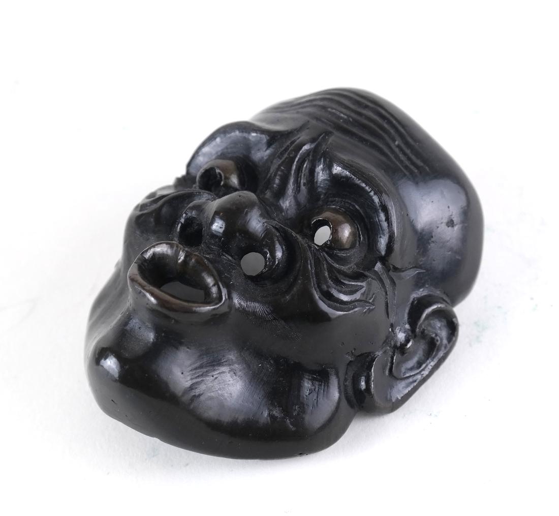 Chinese Bronze Mask: Chinese bronze mask having full facial features. [3 1/2"]