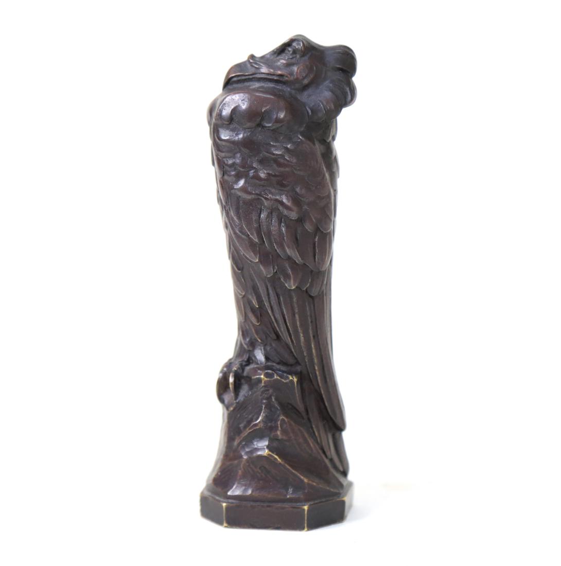 Falcon Bronze: Sculptural bronze, having green patina. [5.5" H]. Figure with no signature; no impressed marks, no hallmarks, no foundry marks.
