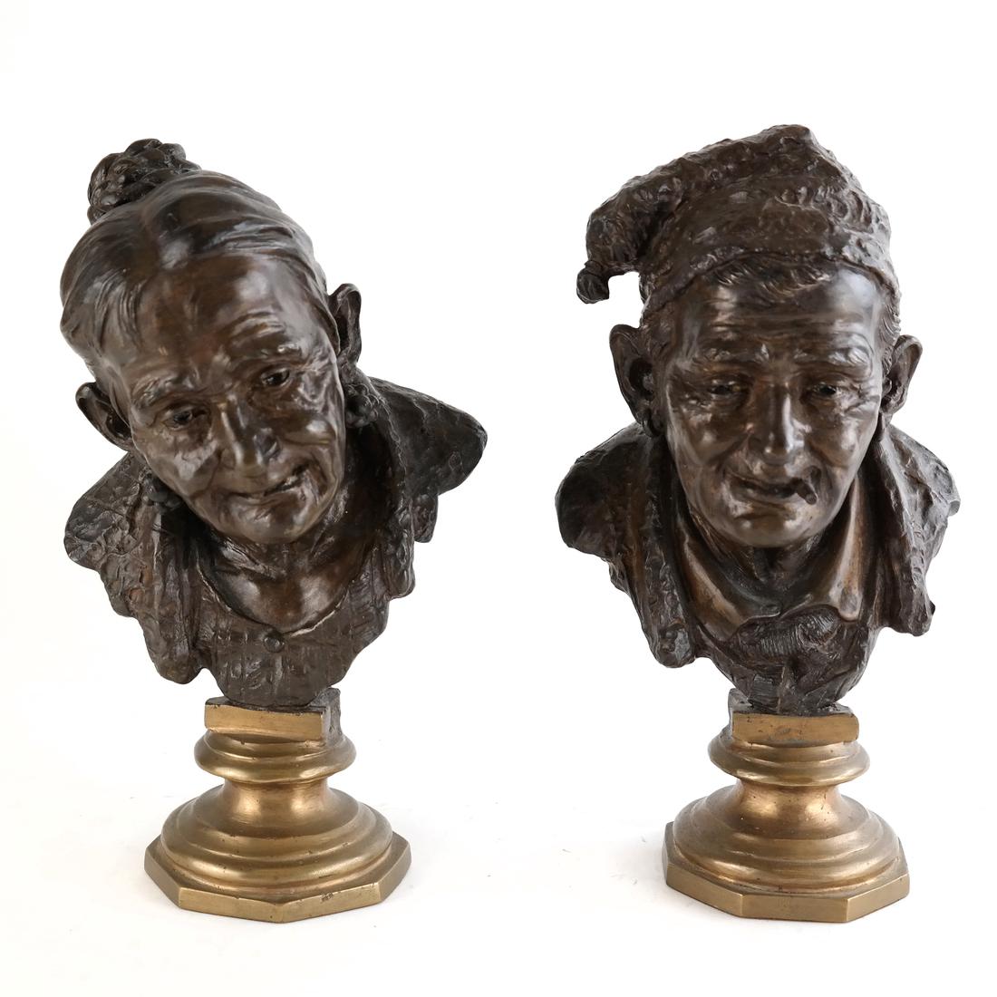 Pair of Busts: Pair of patinated metal busts depicting a man and a woman, mounted on octagonal gilt metal bases. Signed illegibly across back shoulders. [8"H x 5" W x 3 1/4" D]. Overall good condition.