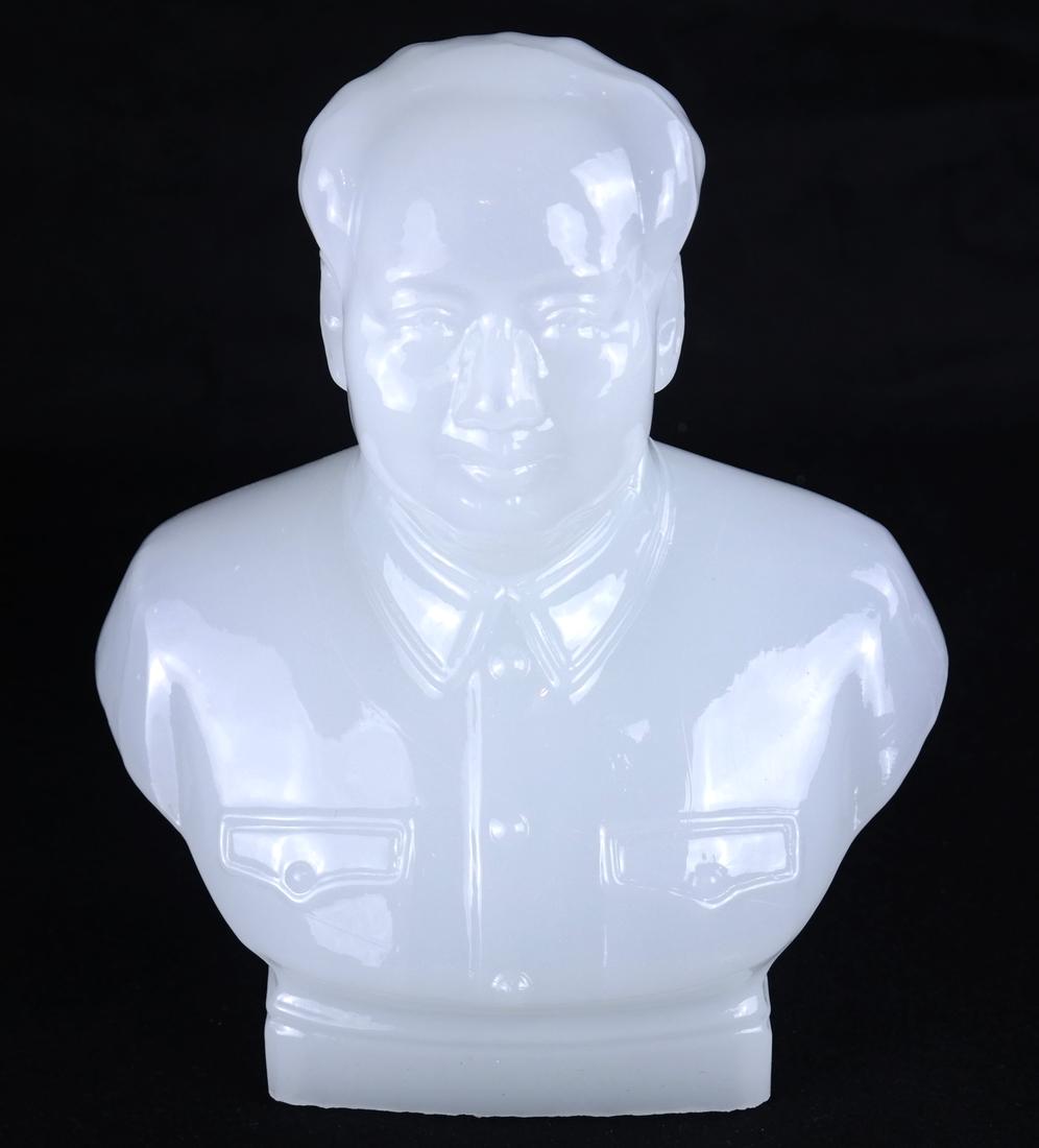 Chinese Molded Glass Mao Bust: Second half of 20th century, molded portrait bust of Chairman Mao Zedong. [9" H x 8" x 3 1/2" D]. Base edge is rough all around.