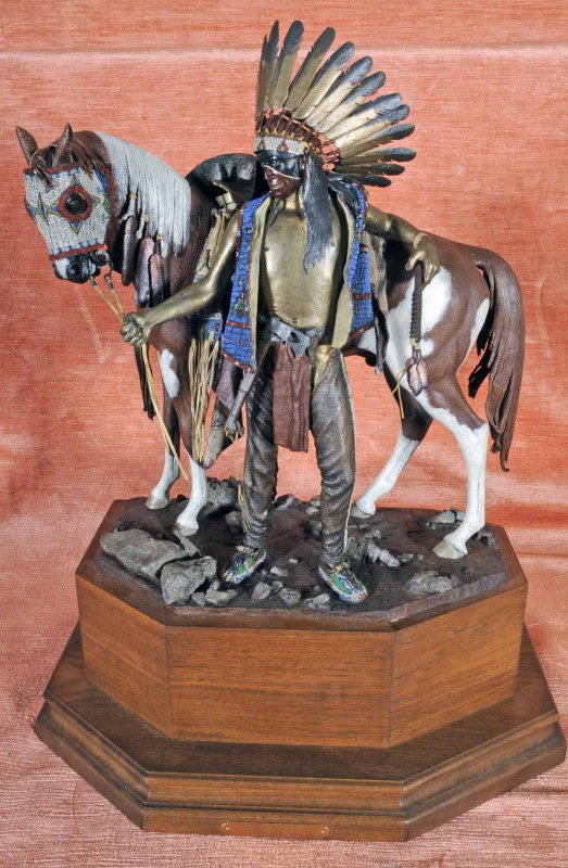 Bronze Figure of an American Indian. Ent. "Young : Bronze Figure of an American Indian. Ent. "Young Men of the Enemy fear His Horses. Sign. Dave Mc Gary. Ltd. Ed. 44/50. 21" H.