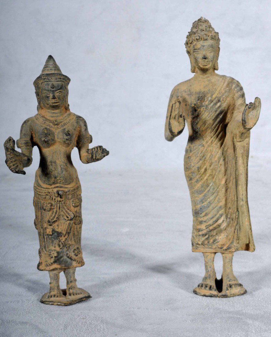 2 CAMBODIAN STANDING FIGURES OF LADIES. ONE DEPICT: 2 CAMBODIAN STANDING FIGURES OF LADIES. ONE DEPICTS A LADY WITH HER HANDS SPREAD OUTWARD. THE OTHER SHOWS A FIGURE HOLDING ITEMS IN HER HANDS. 7 3/4" H.
