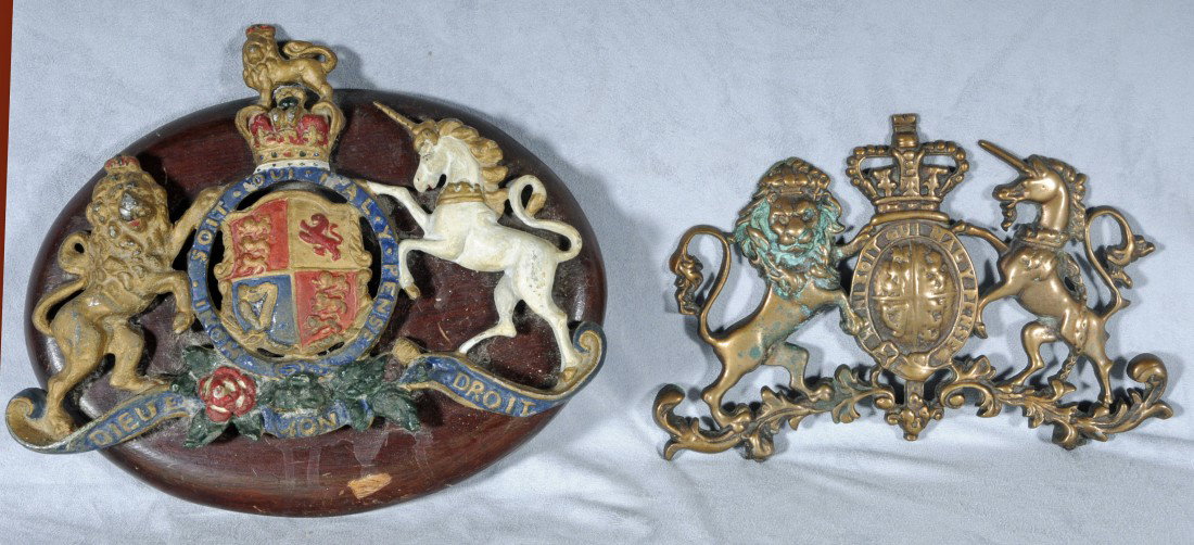 2 METAL COAT OF ARMS. 8" H X 11" W & 7" H X 10" : 2 COAT OF ARMS. one spelter or lead 8" H X 11" W & bronze 7" H X 10" W.