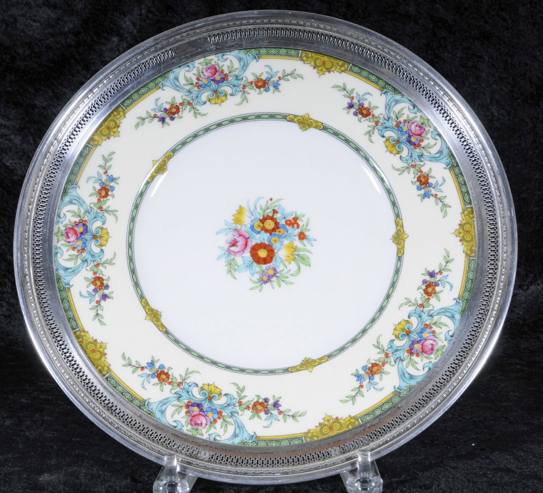 ENGLISH MINTON PLATE W/ A STERLING SILVER BORDER. : ENGLISH MINTON PLATE W/ A STERLING SILVER BORDER. ENAMEL MULTI-COLOR FLORAL DECORATION ON THE CENTER & THE BORDER. 12" DIA.
