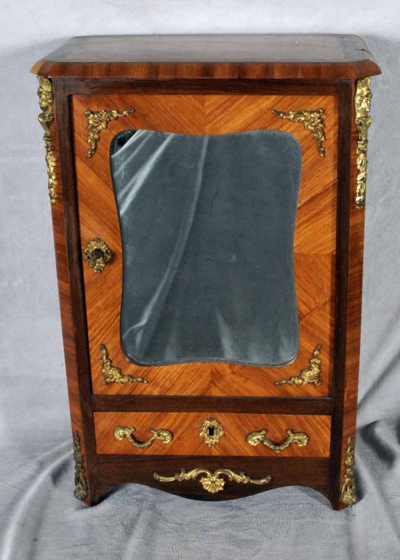 19TH C. FRENCH MINIATURE SINGLE DOOR ARMOIRE. ROSE: 19TH C. FRENCH MINIATURE SINGLE DOOR ARMOIRE. ROSEWOOD & KINGWOOD MIRRORED DOOR, SINGLE DRAWER, CABRIOLE LEGS. ORMOLU MOUNTS. 18 1/2" H X 12 1/4" W X 7" D.