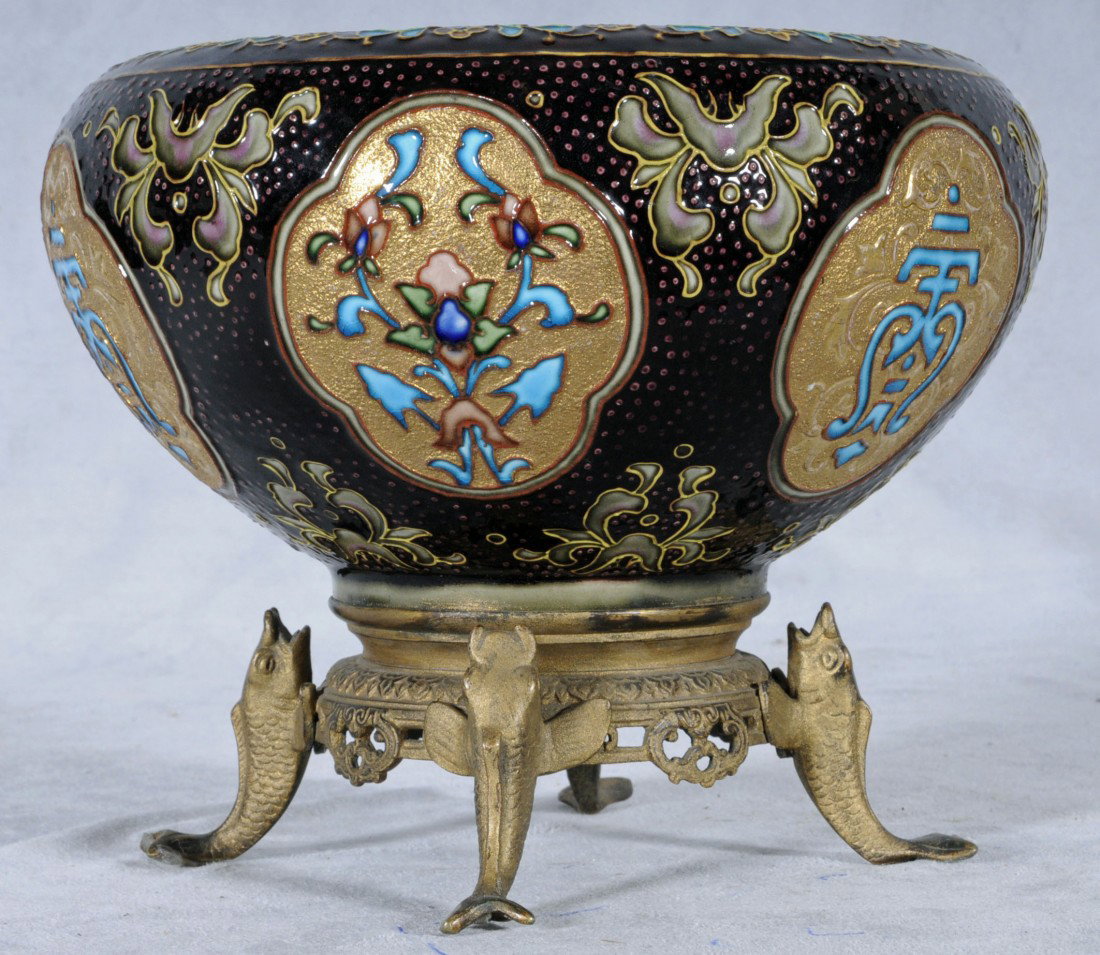 ANTIQUE EUROPEAN CERAMIC BOWL WITH ENAMEL DECORATI: ANTIQUE EUROPEAN CERAMIC BOWL WITH ENAMEL DECORATION AND ORMOLU FEET. 7 1/2" H X 8 7/8" DIA.