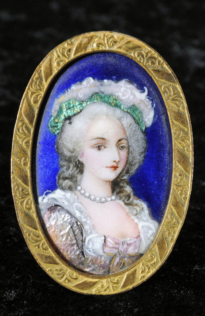 OVAL FRENCH LIMOGES ENAMEL PLAQUE OF A LADY IN A P: OVAL FRENCH LIMOGES ENAMEL PLAQUE OF A LADY IN A PINK DRESS. BLUE BACKGROUND. 2 1/2" H X 1 1/2" W